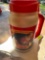 Coca-Cola water jug and propane bottle