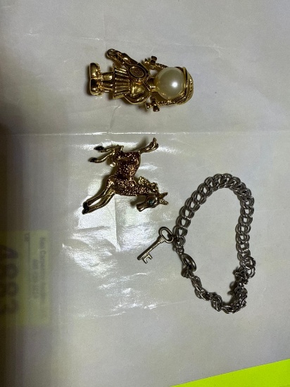 Bracelet and 2 pins