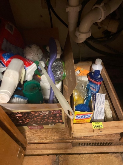 Cleaning supplies in box and wood crate