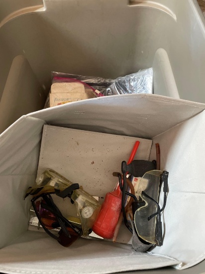 Tote with misc items inside, light covers, door knobs, and more