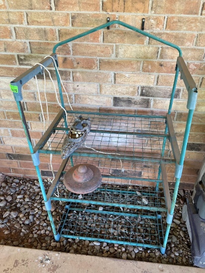 Outdoor metal shelf and some decor