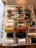 Sewing thread in container