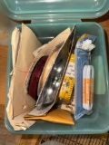 Container with sewing supplies