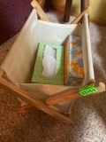 Small storage rack for magazine or books with pockets