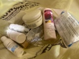 hand powder, hand lotion, wallet and nail filler