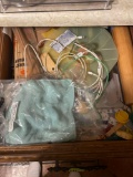 Items in drawer, rolling pin, clothes pins, knife, and more