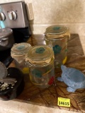 cutting board, jars, turtle decor and recipe holder