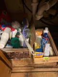 Cleaning supplies in box and wood crate