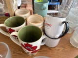 coffee mugs and candle holder