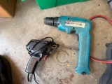 craftsman electric stapler, jumper cables, soldering gun, two Makita drills, air vacuum pump, oil