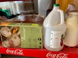 Flamingo dinnerware dishes (may not be complete set, box is open) coffee thermos, carpet shampoo