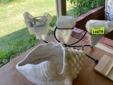 Candle holder decor and sea shell decor on back porch