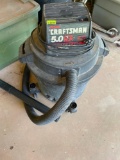 Sears craftsman wet dry vac on back porch