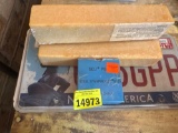 Two license plates, belt, cleaners, still stamping set