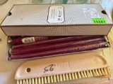 paint stick brush and candles