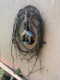 bird house and sticks