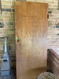 Wooden door on back porch