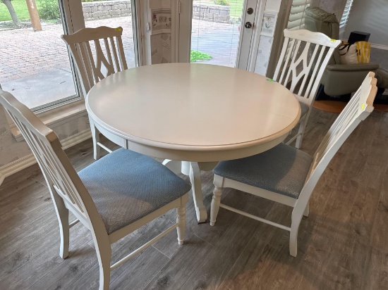 Kitchen table with one leaf and four chairs, 49 inch diameter without leaf, 18 inch, bring Help to