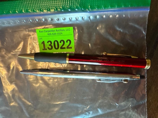 2 pens, one is a Cross