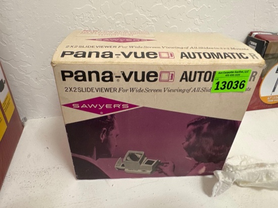 Pana-cue view automatic 2 x 2 slide viewer