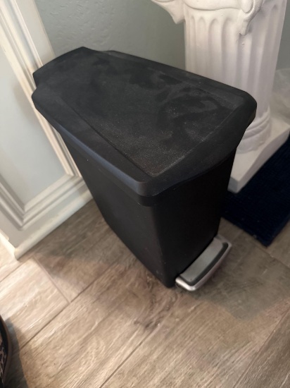 Decor, trash can and rug