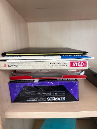 2 binders and papers