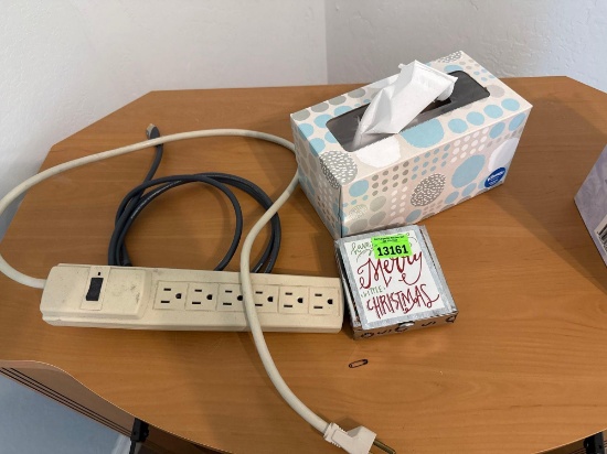 tissue box, drink coasters, extension cord
