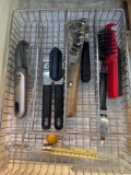 spatula, can opener, brush peeler, knives and wire basket