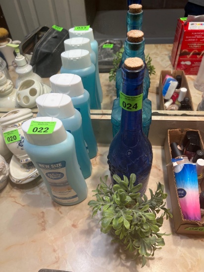 2 colorful glass bottles