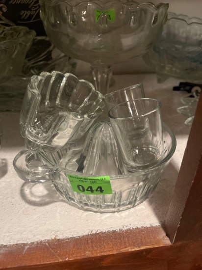 Glass orange juicer with glasses