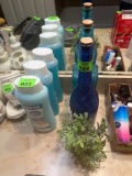 2 colorful glass bottles