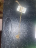 Ladies Necklace with red stone in center