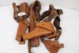 4 brown leather holsters