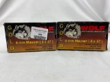 Two full boxes of gold wolf ammo