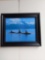 Framed Orcas Swimming by John Hyde