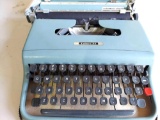 Blue Lettera 22 typewriter with case