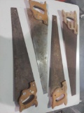 9 antique saws, different shapes and sizes