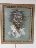 Clown photo with glass in frame.