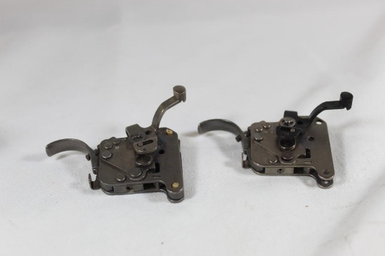 Two Remington 700 triggers. Used in good condition.