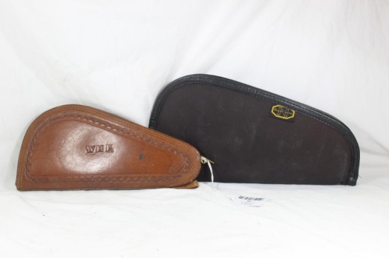 Two pistol cases. One brown leather and one nylon, Both are Sherpa lined, in good condition.