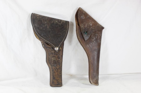 Two leather holsters Both used in fair condition. One is lined.