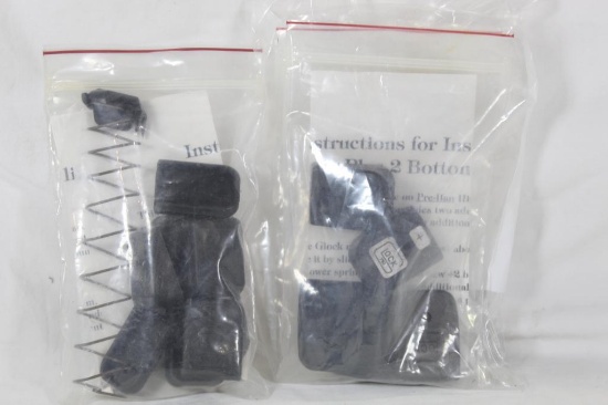 Bag of magazine extensions. New. for Glock, one magazine spring.