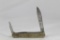One WWII Nazi Germany 3 blade whittler. As new with brass handles.