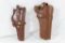 Two right handed brown leather holsters. One S&W 4