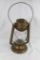 One C.T. Ham GEM brass kerosene lamp. Used, has a repair on the kerosene tank, but appears to be in