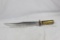 One steel file Bowie style knife with a 50 cal brass rifle case. Made by Pearce. 6