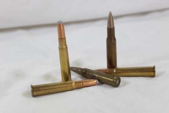 Assorted ammo. Baggy with 14 rounds of mixed rifle ammo & baggy with 2 clips,10 rounds, of 8mm