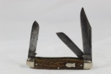 One Schrade Walden bone handle 3 blade stockman pocket knife. Carbon steel with nice patina. Used in