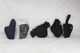 Five nylon holsters. Two right handed, two left handed and one ambi. Like new.
