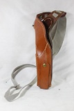 One Brauer Brothers brown leather right sided left hand draw shoulder holster. Like new.